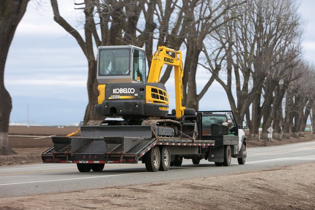 This could be you, driving away with a free Kobelco 55SRx mini excavator. 