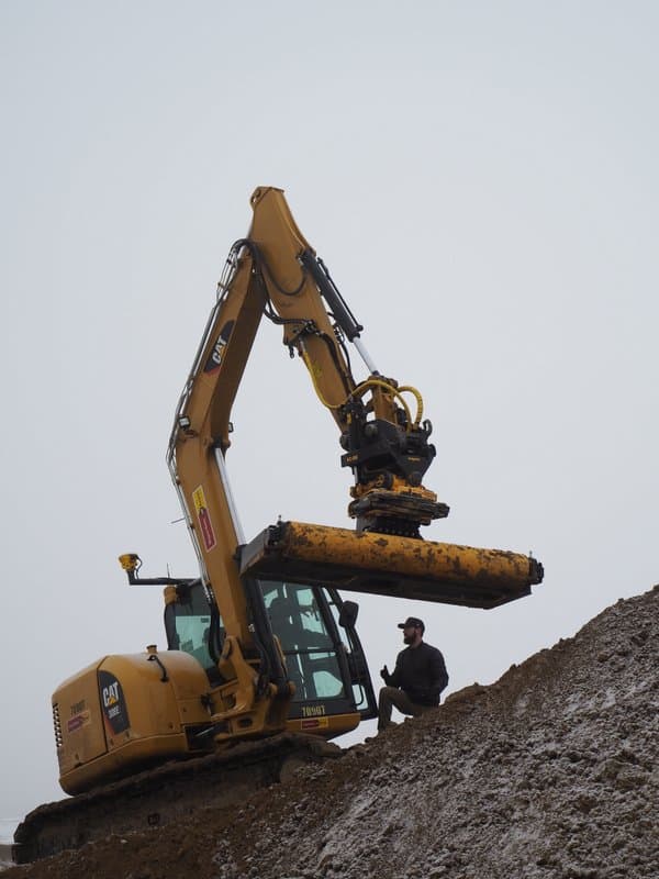 Unconventional Applications Cat  Excavator  and Trimble 