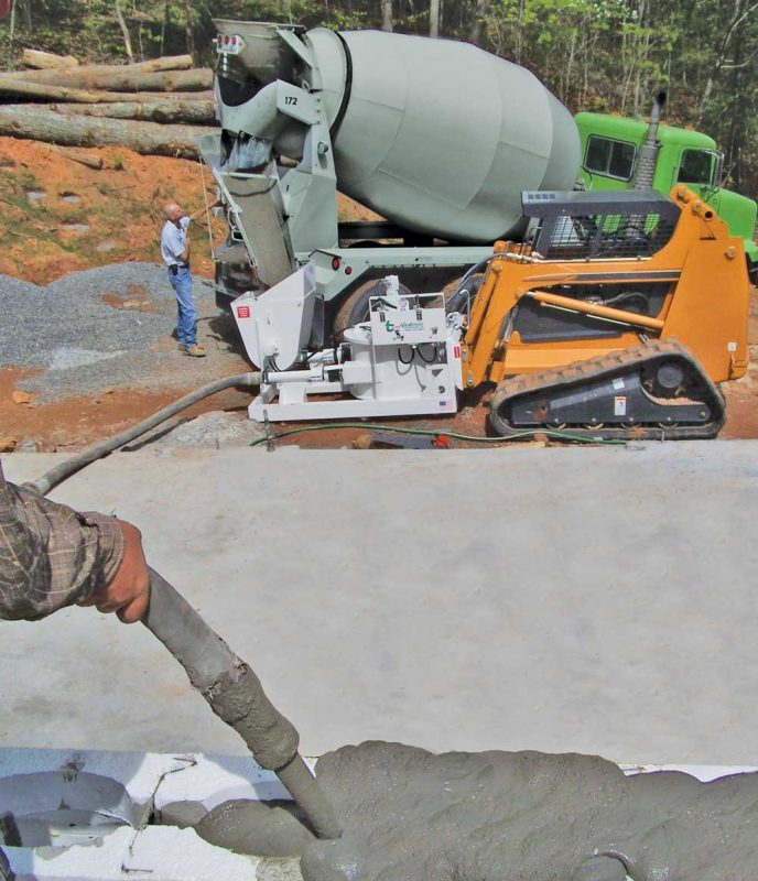 Concrete truck chute pouring wet cement Mix into metal bucket