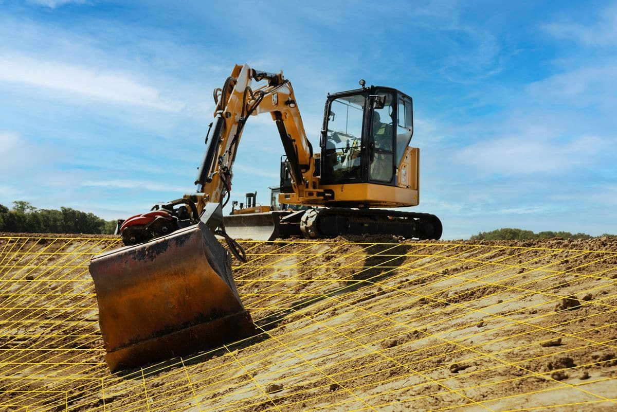 Cat's New Mini Excavator Accepts Skid Steer Attachments