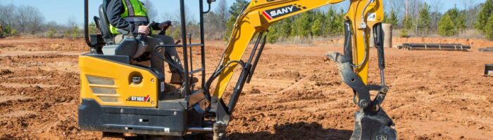 Sany SY16C -2 mini excavator with a retractable undercarriage in the dirt