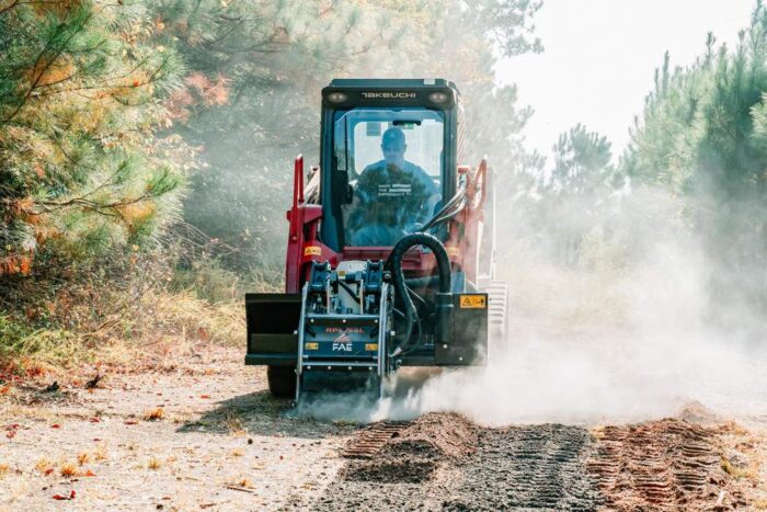 Takeuchi cold planer on a compact track loader