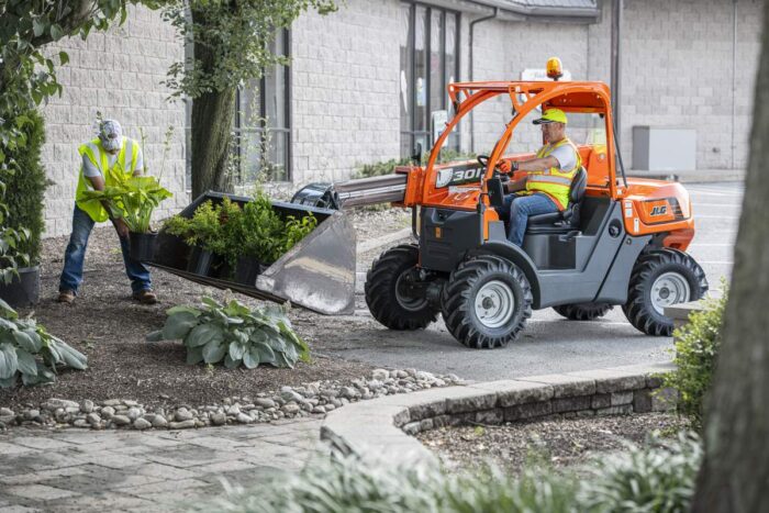 Skytrak 3013 JLG compact telehandler working in landscaping 