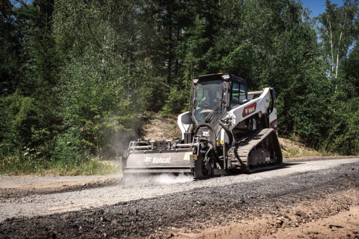 Bobcat T86 skid steer with a cold planer attachment