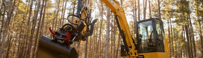 Caterpillar mini excavator with bucket