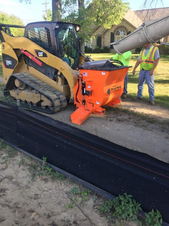 EZG concrete mixer on a skid steer