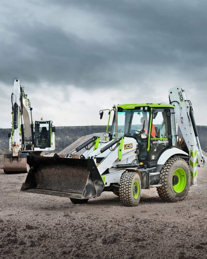 JCB hydrogen powered backhoe working with a hydrogen excavator 