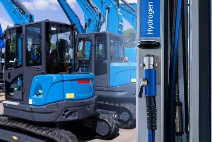 Hydrogen fueling nozzle on a background of fuel cell construction machines. Concept.