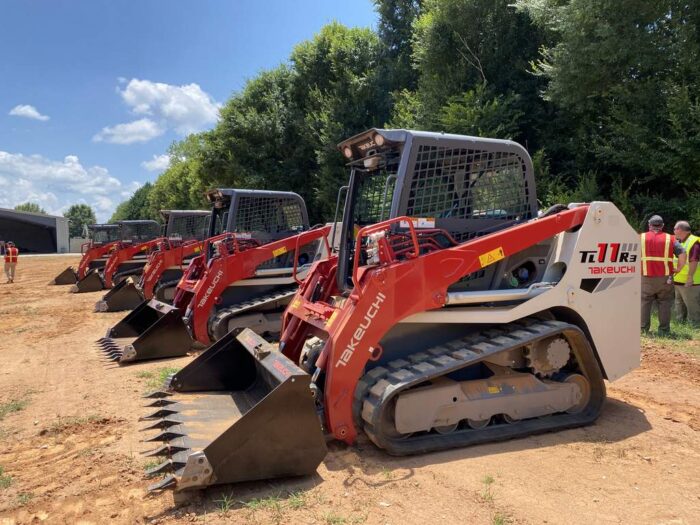 Takeuchi TL11R3 compact track loaders sitting out Takeuchi's Georgia Training Center