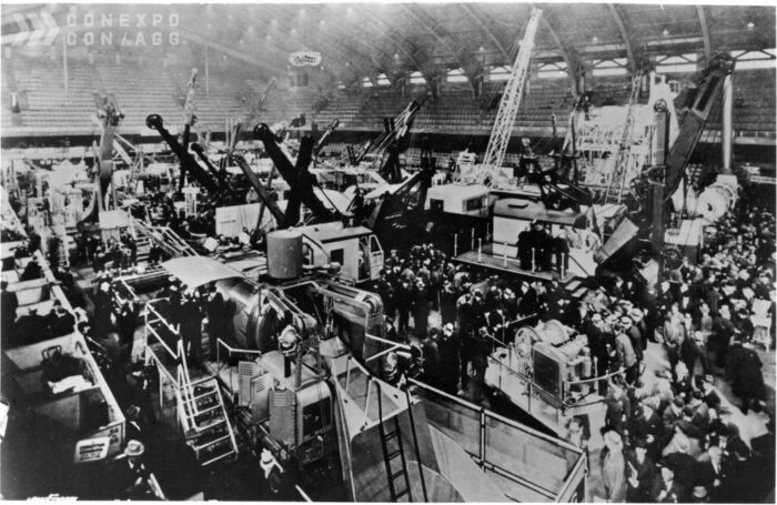 Old image of CONEXPO black and white excavators and people