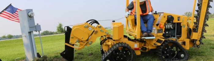 Vermeer PTX44 trencher using a vibratory plow attachment