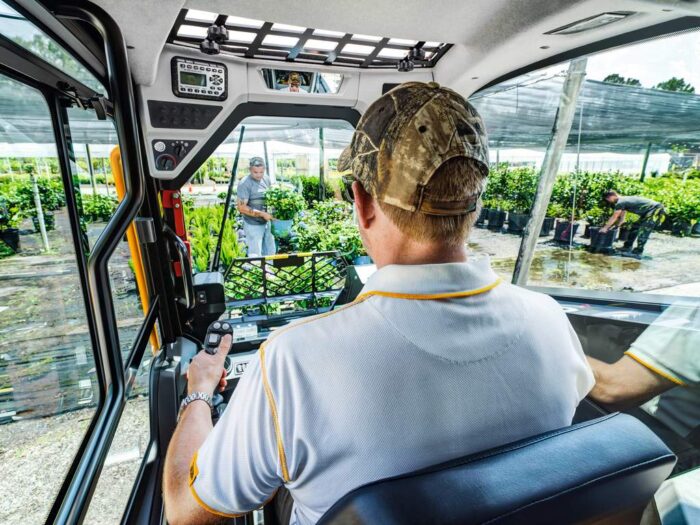 JCB cab operator station operator driving compact track loader 