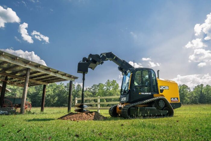 4TS Teleckid and 400T compact track loader with auger attachment 