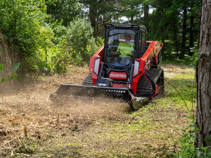 MAnitou_3350VT compact track loader with a brush cutting attachment 
