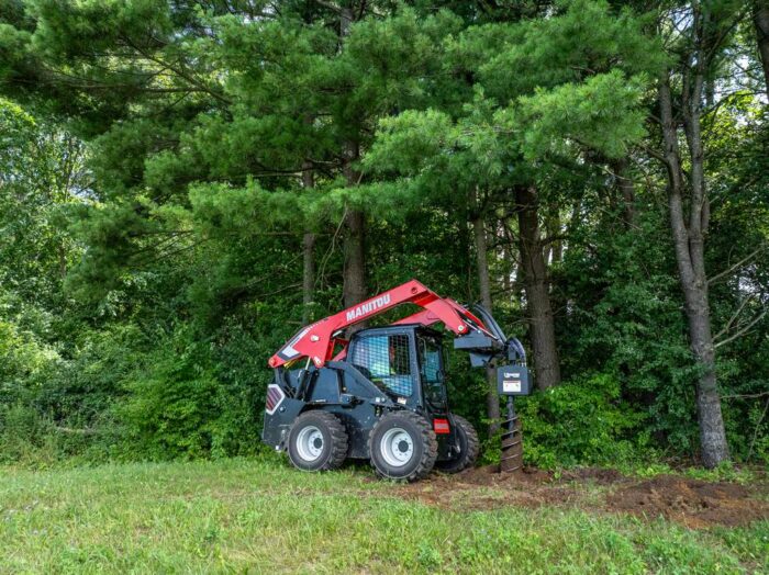 Manitou 3600V skid steer with an auger attachment 