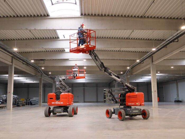 Skyjack SJ60-AJE boom lift working indoors 
