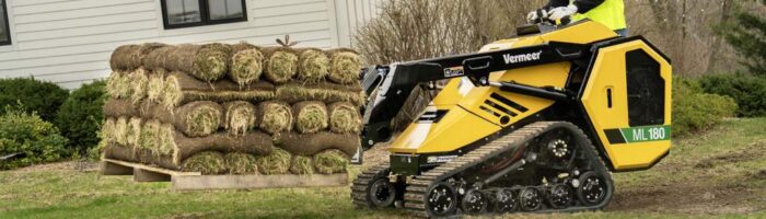 Vermeer ML180 mini loader carrying a pallet of sod