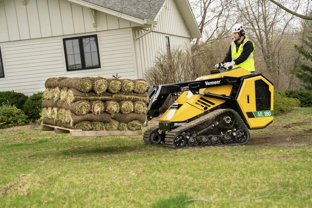 Vermeer ML180 mini loader carrying a pallet of sod
