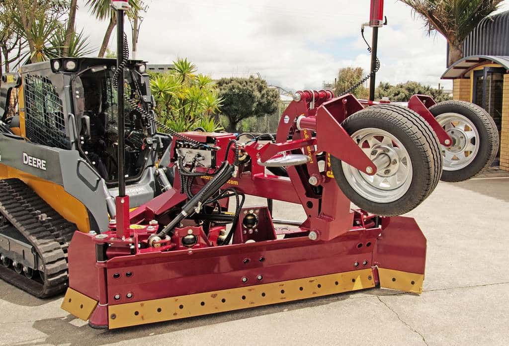 SharpGrade Introduces Hydraulic Retracting Front Wheel Assembly for G116 Grader Blade