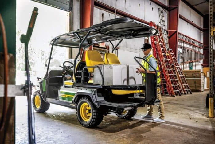 John Deere Gator GX Electric utility vehicle in a warehouse