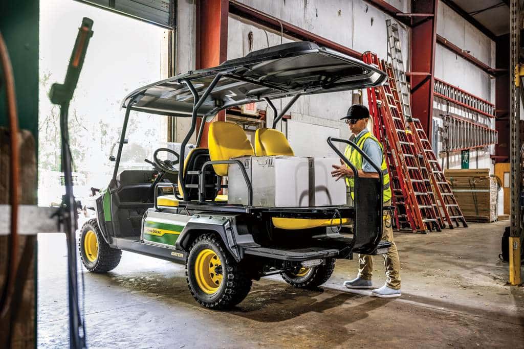 John Deere Gator GX Electric utility vehicle in a warehouse