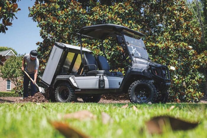 GX Gator John Deere grey electric dumping bed